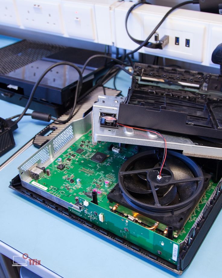 Console open on repair bench at FixVault Dubai